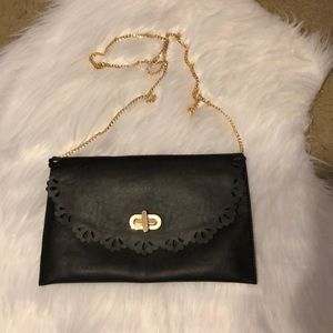 Black clutch with shoulder chain